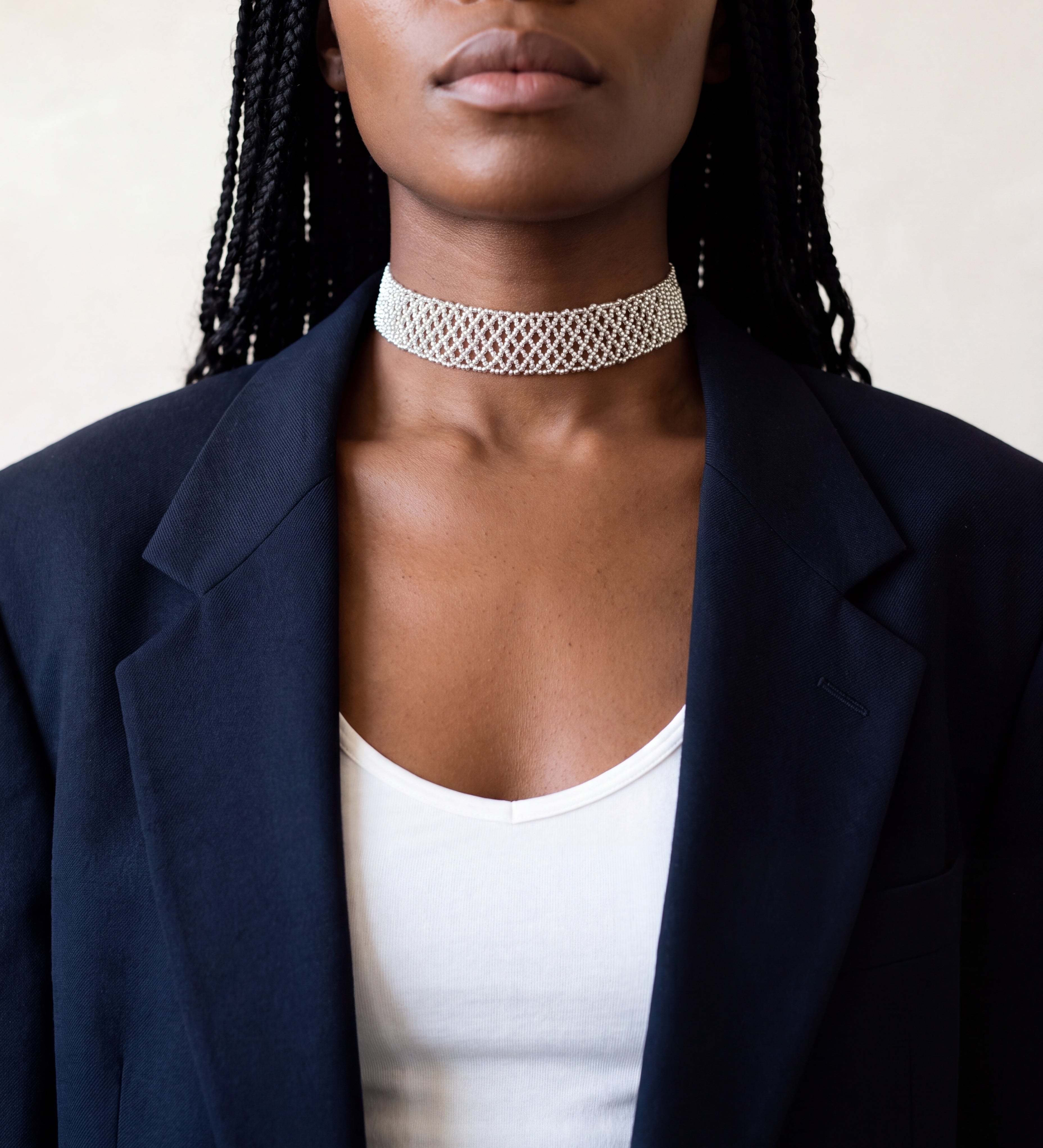 Silver Tierra choker, a Miyuki seed bead choker, worn with a navy blazer and white top