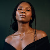 Raw emerald set worn, close up